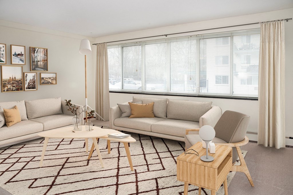 a living room with two couches and a coffee table