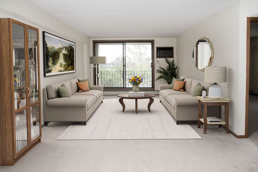 a living room with couches and a table