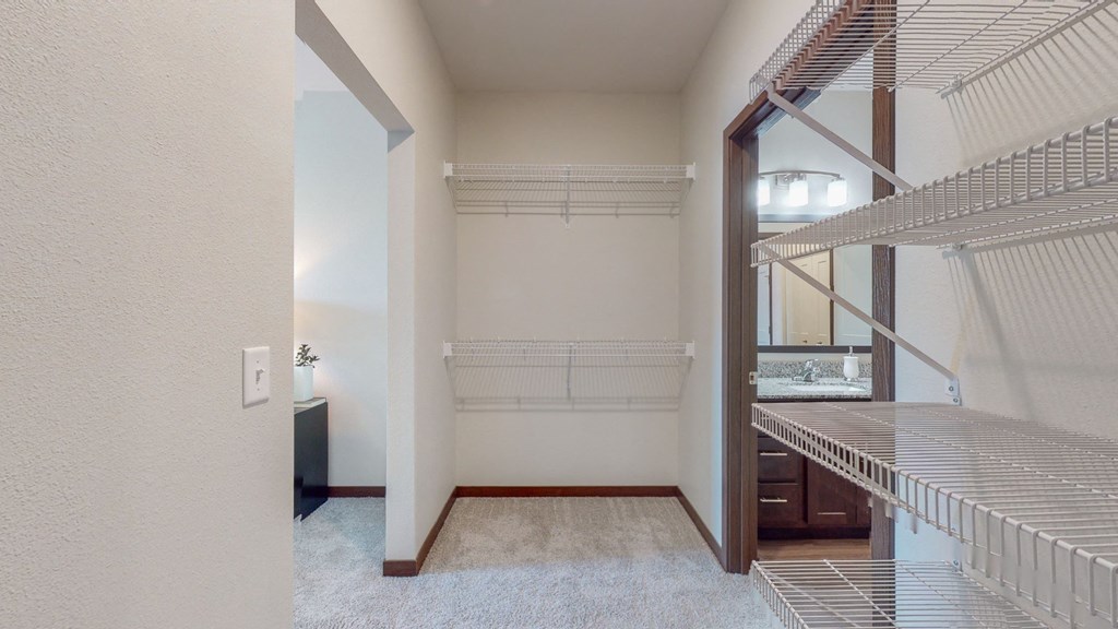 a large walk in closet in a bedroom at Lake Jonathan Flats, Minnesota, 55318