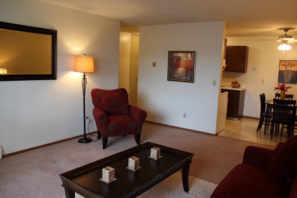 a living room with a couch and a table