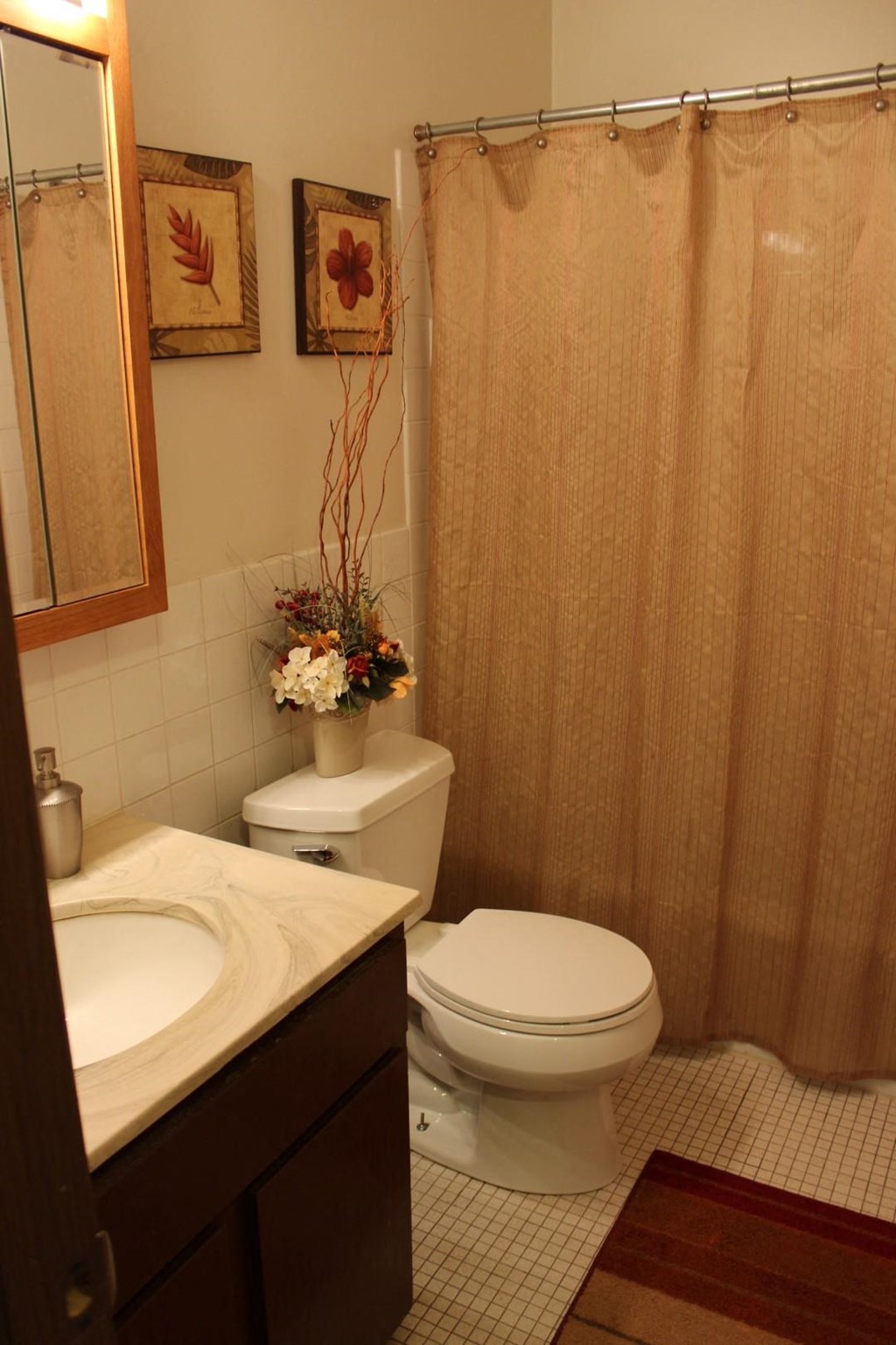 a bathroom with a toilet and a sink