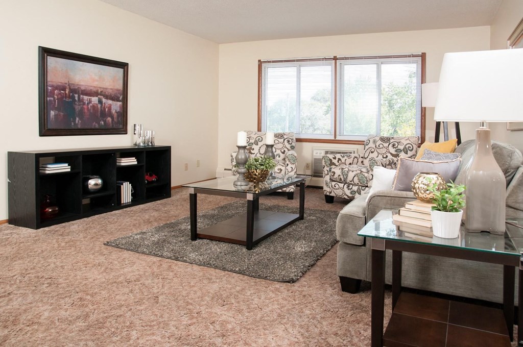 a living room with a couch and a table