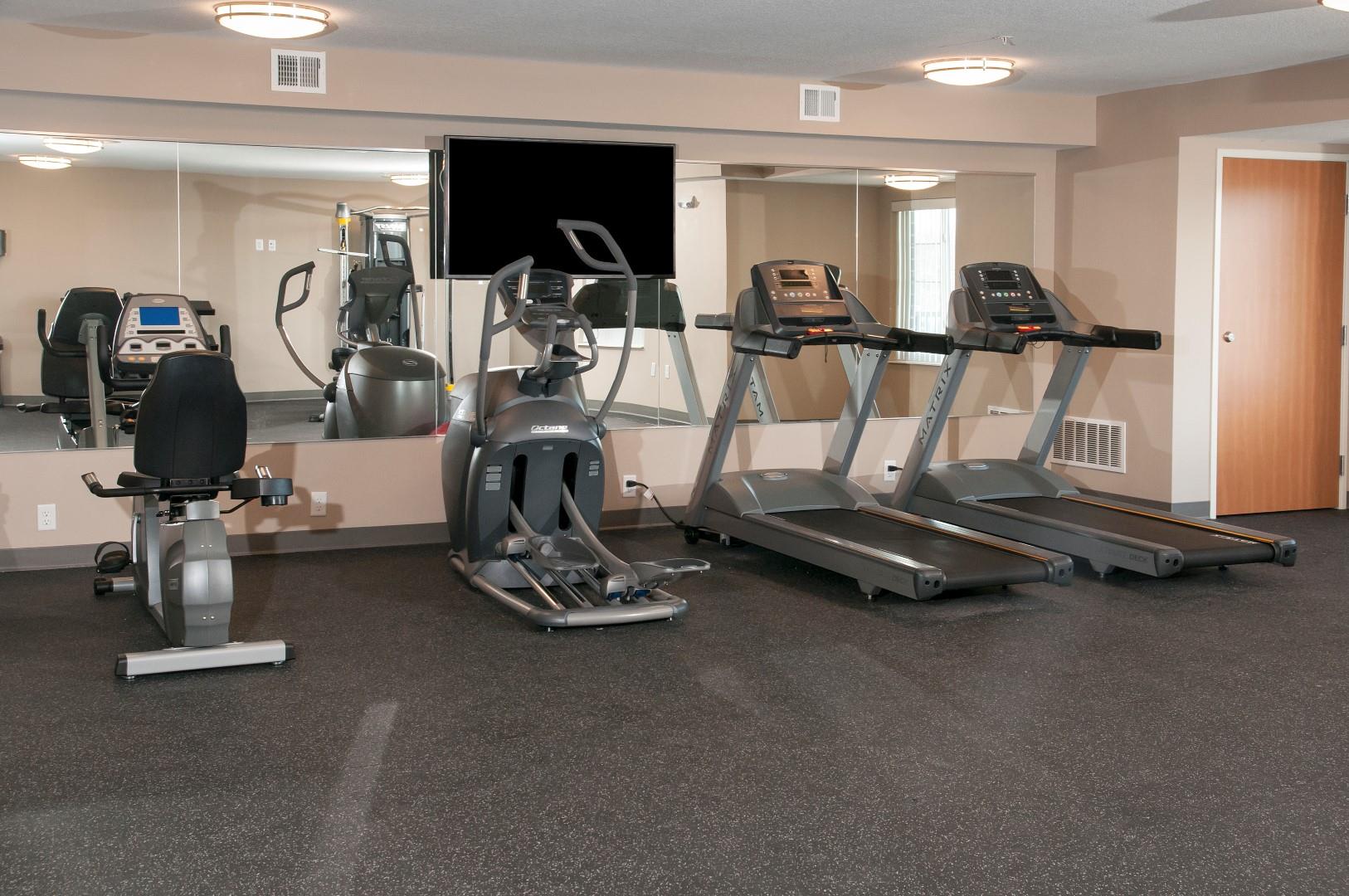 Carver Crossing Fitness Room with Bike, Elliptical and Treadmill Machines