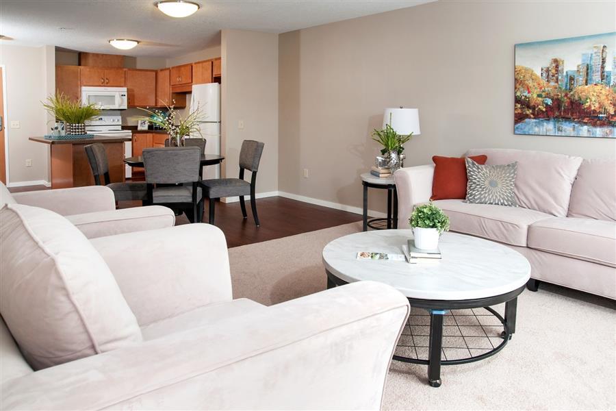Open Floor Plan Connecting Living Room, Dining Room and Kitchen at Carver Crossing