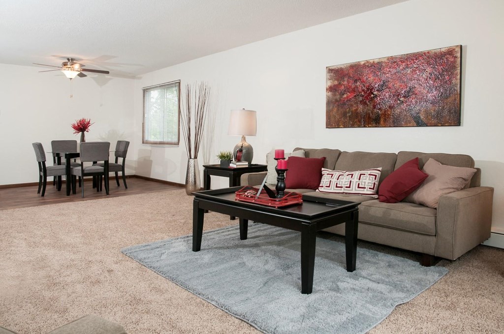 a living room with a couch and a table