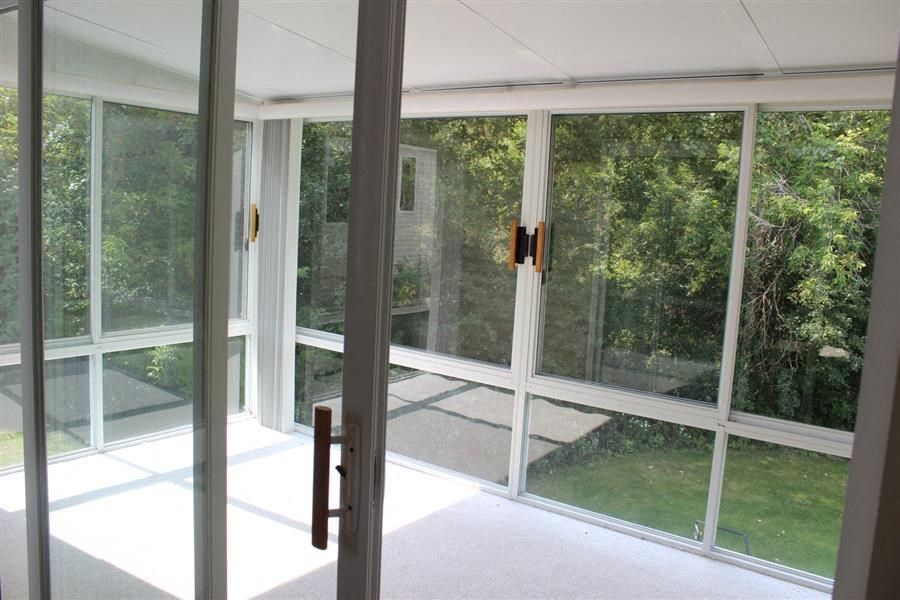 a room that has a bunch of windows in it