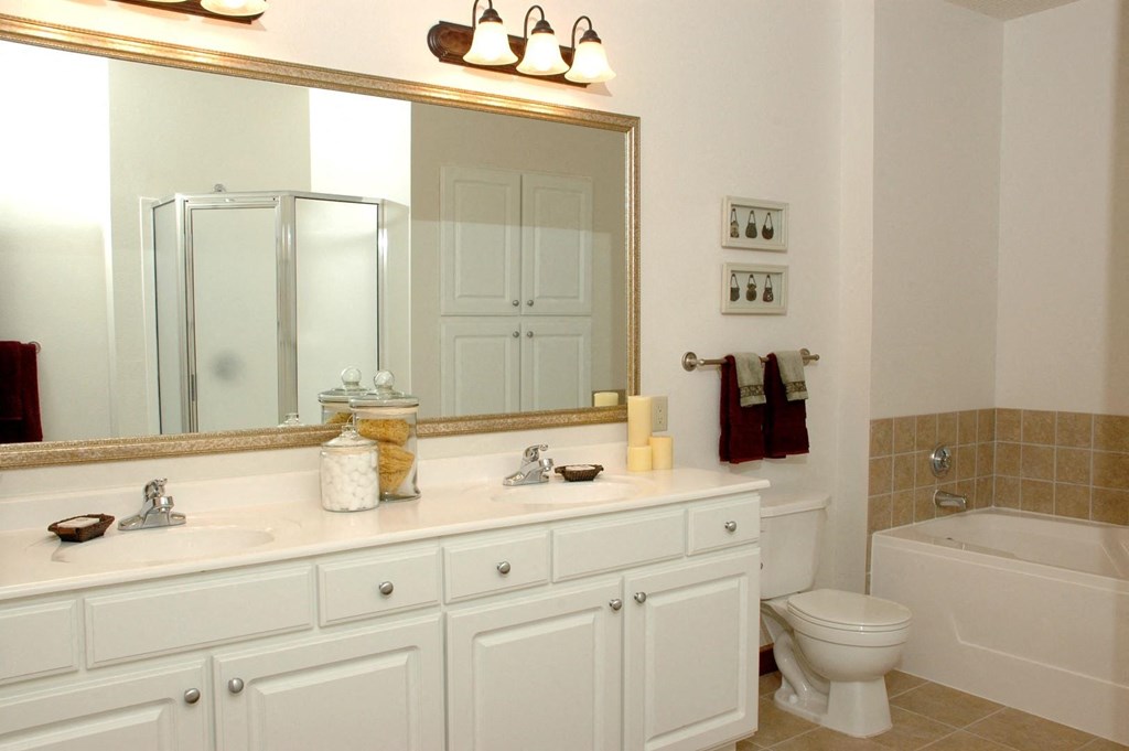 large bathroom with double vanity in select homes