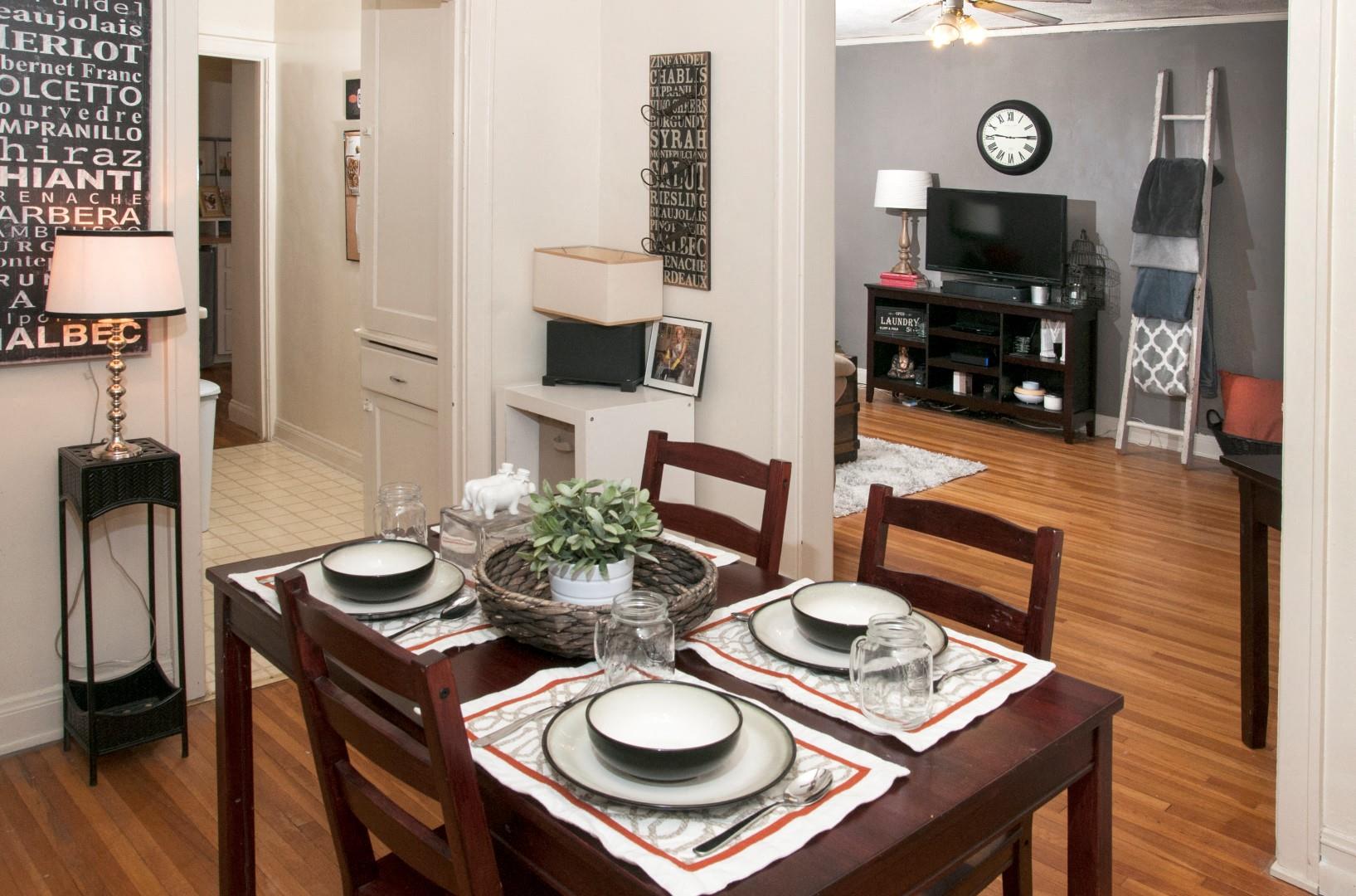 Warm Dining Room Connecting to Living Room and Kitchen in Minneapolis Apartment
