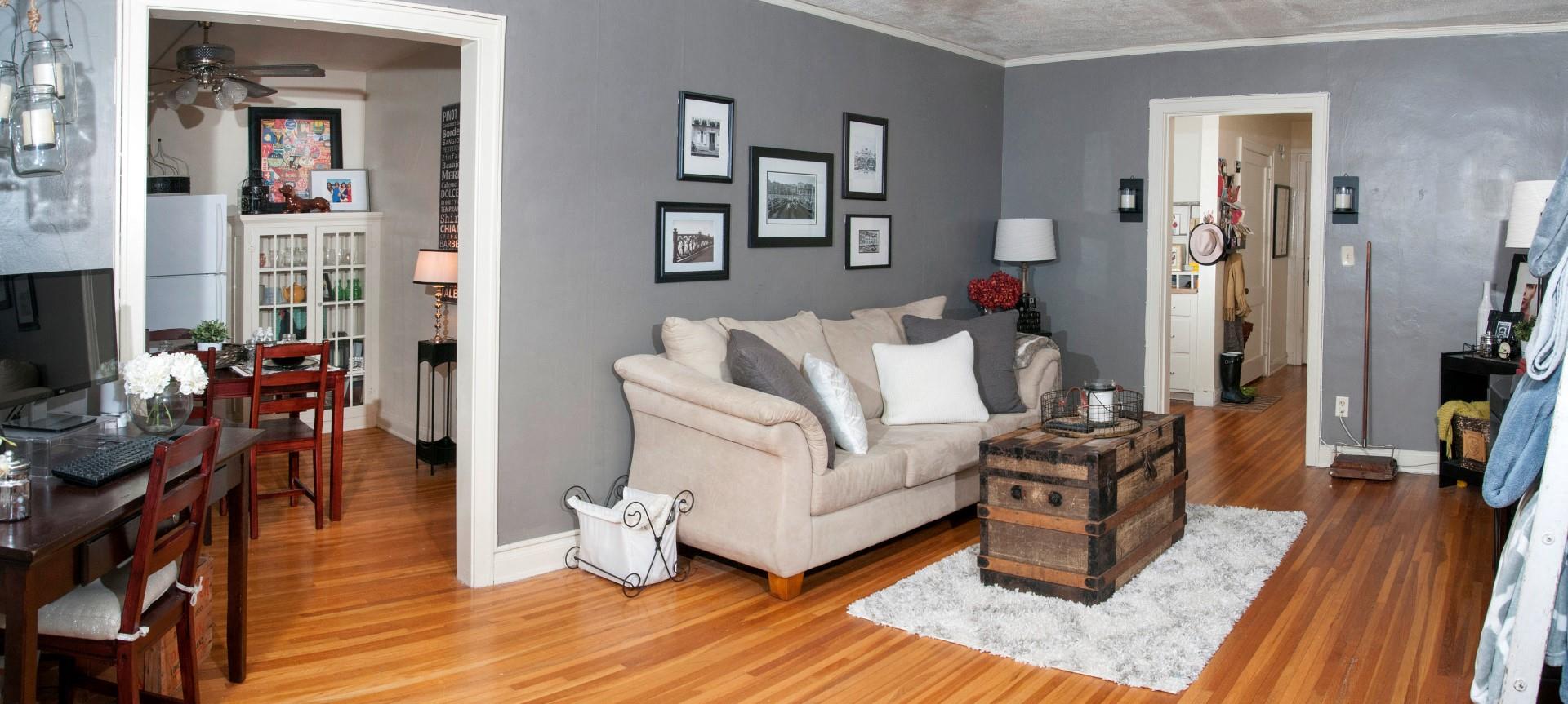 Open Livingroom with Grey Walls and White Trim at 3500 Dupont Apartments