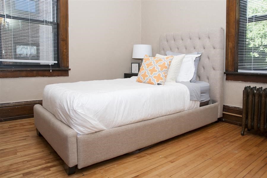 2 bedroom with two windows for natural lighting