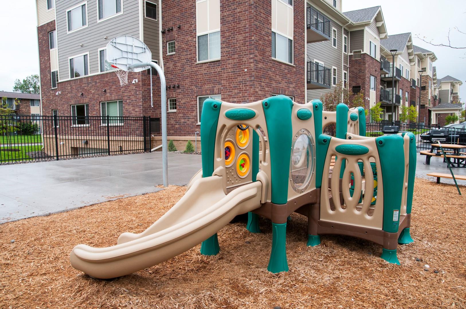 Outdoor Playground in Courtyard of New Hope Apartment