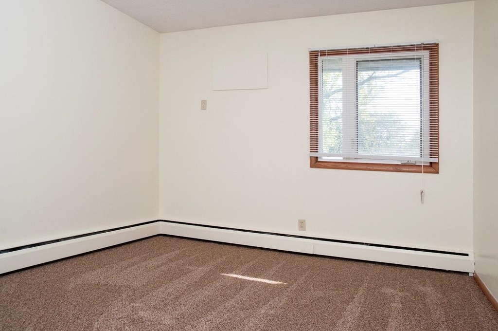 Bedroom with carpeting and ceiling fan