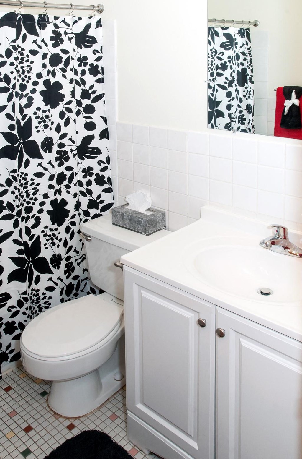 bathroom vanity and tub-shower