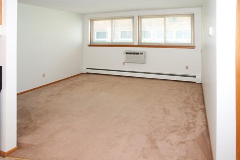 the living room is clean and ready for us to move in