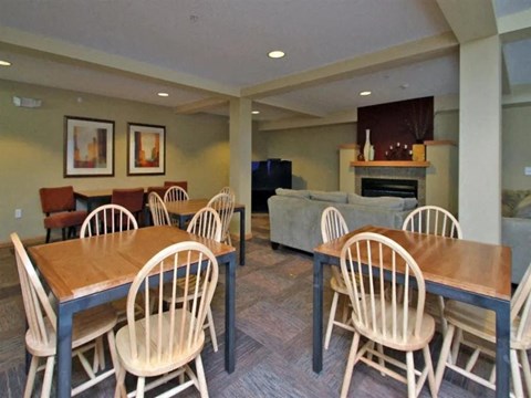 Dining Room with a Wooden Table at Joseph's Pointe at Upper Landing Apartments, St. Paul, Minnesota