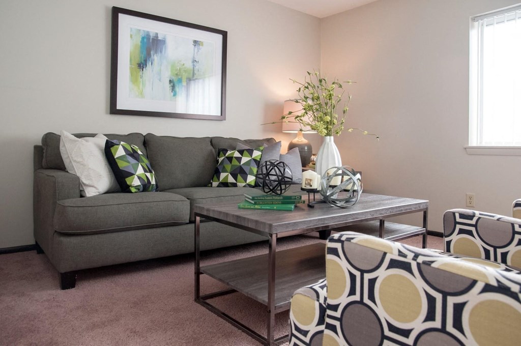 a living room with a couch and a coffee table
