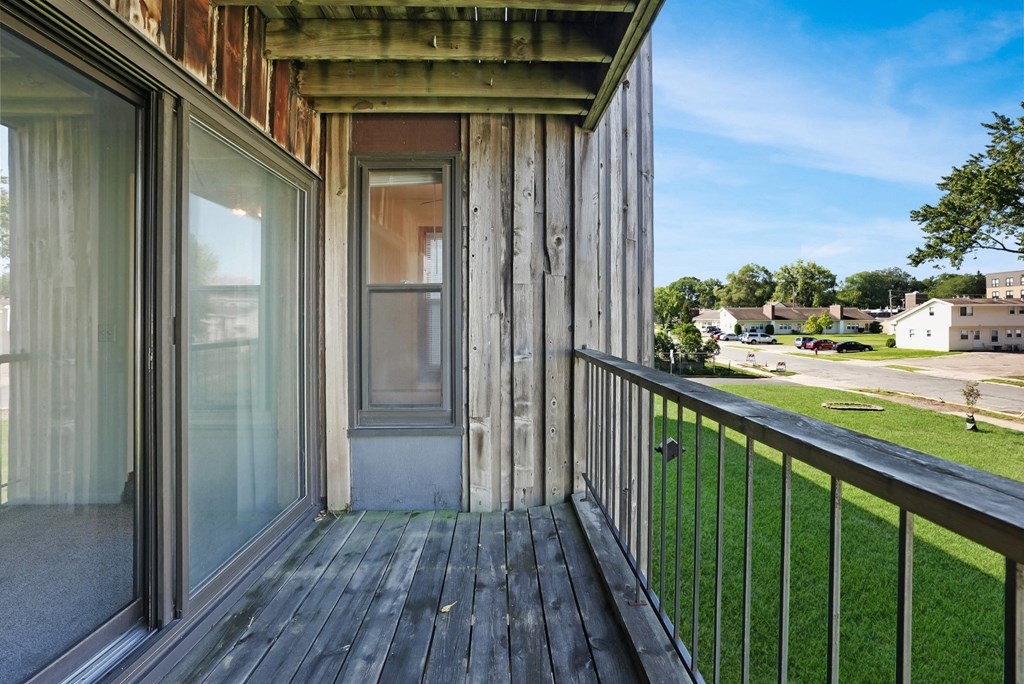 the view from the balcony of a home on a sunny day