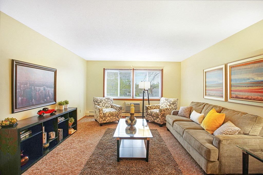 a living room with a couch and a coffee table