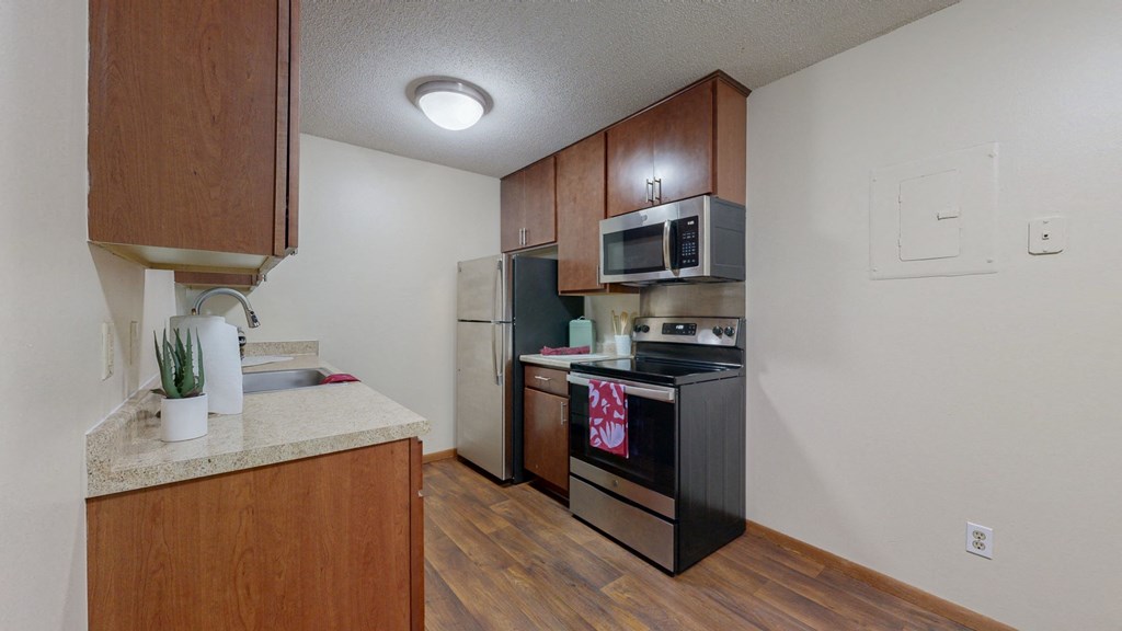 this is a photo of the kitchen of a 560 square foot, 1 bedroom apartment at as