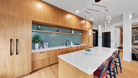 A kitchen with wooden cabinets and a white countertop.