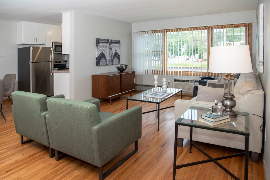 large windows, refinished hardwood floors