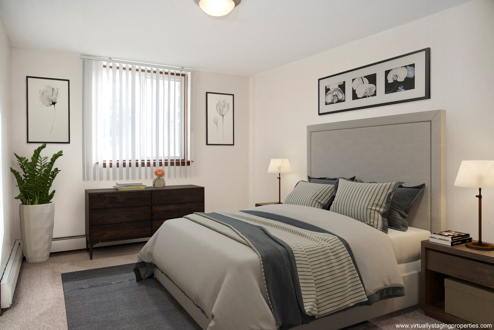 a bedroom with a bed and a dresser