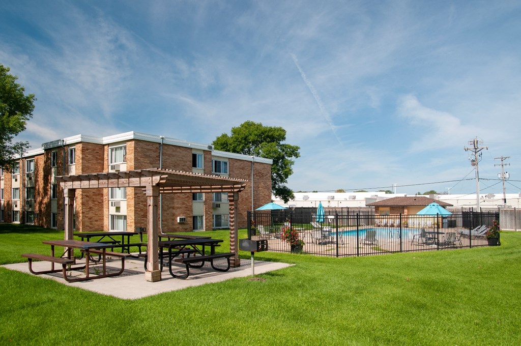 our apartments have a spacious yard with picnic tables and a pool