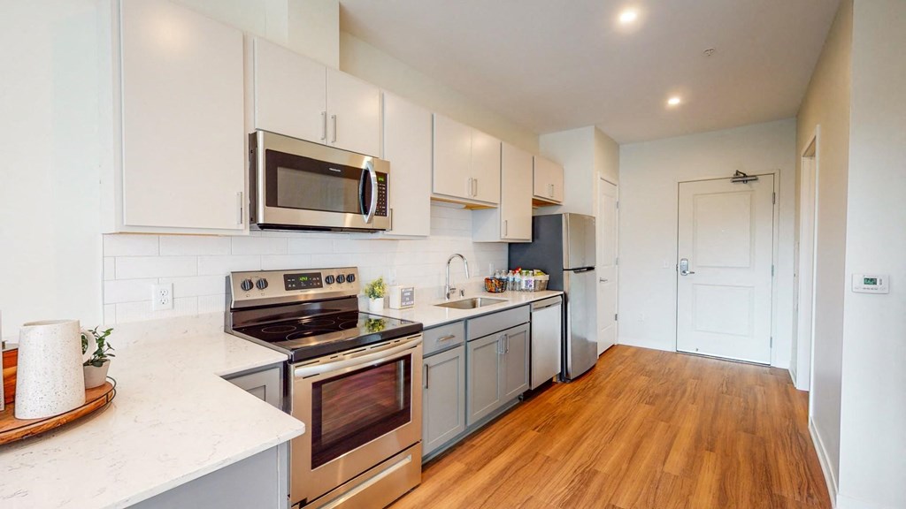 Well Equipped Eat-In Kitchen at The Arlow on Kellogg, Minnesota