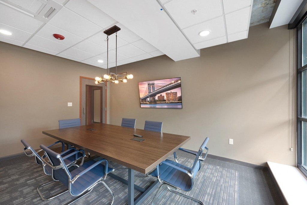 Conference Room With TV at The Yards and Backyards, South St. Paul, MN
