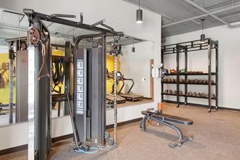 the gym at the flats at big tex apartments