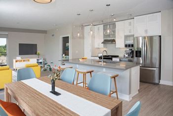 Classic White Designer Cabinetry With Soft-Close Drawers at The Finn, Saint Paul