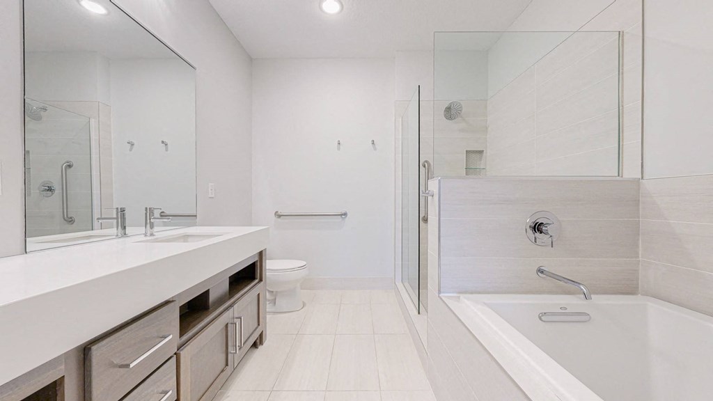 a bathroom with a bathtub and a sink