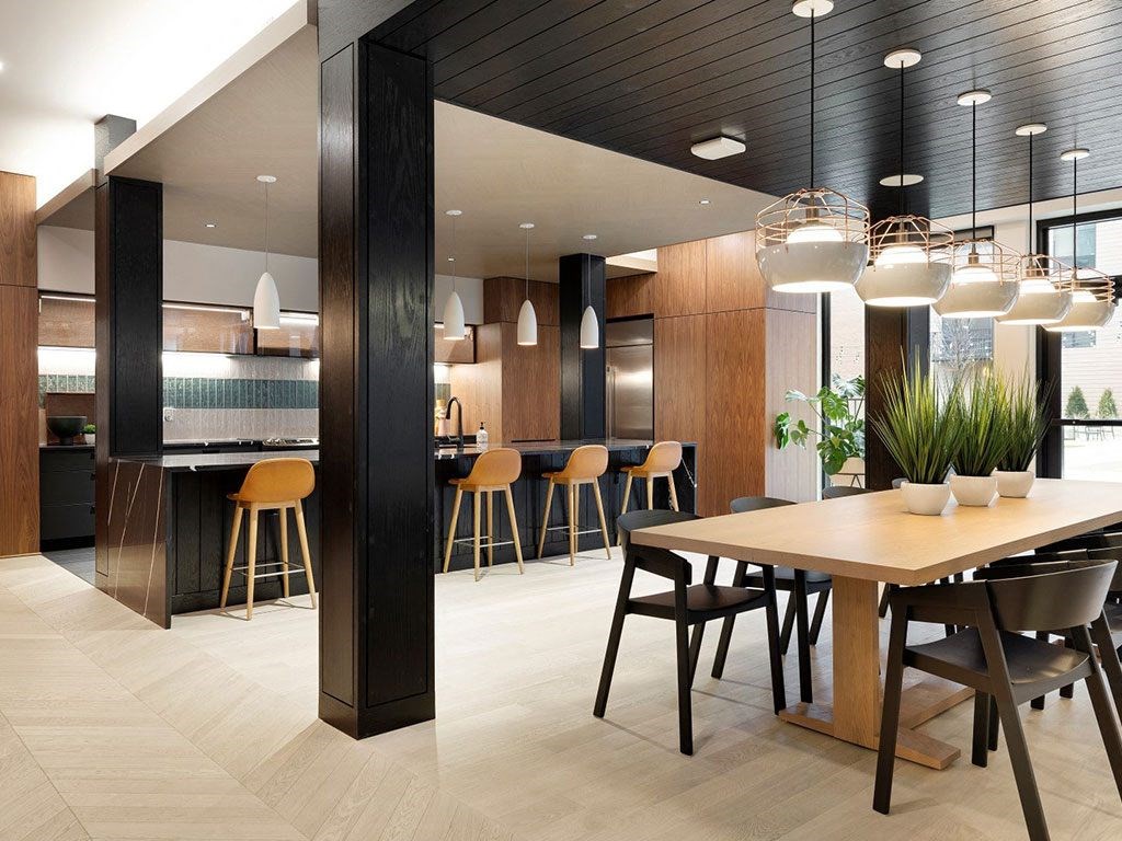 Community room with kitchen at The Hill Apartments, Saint Paul, 55102