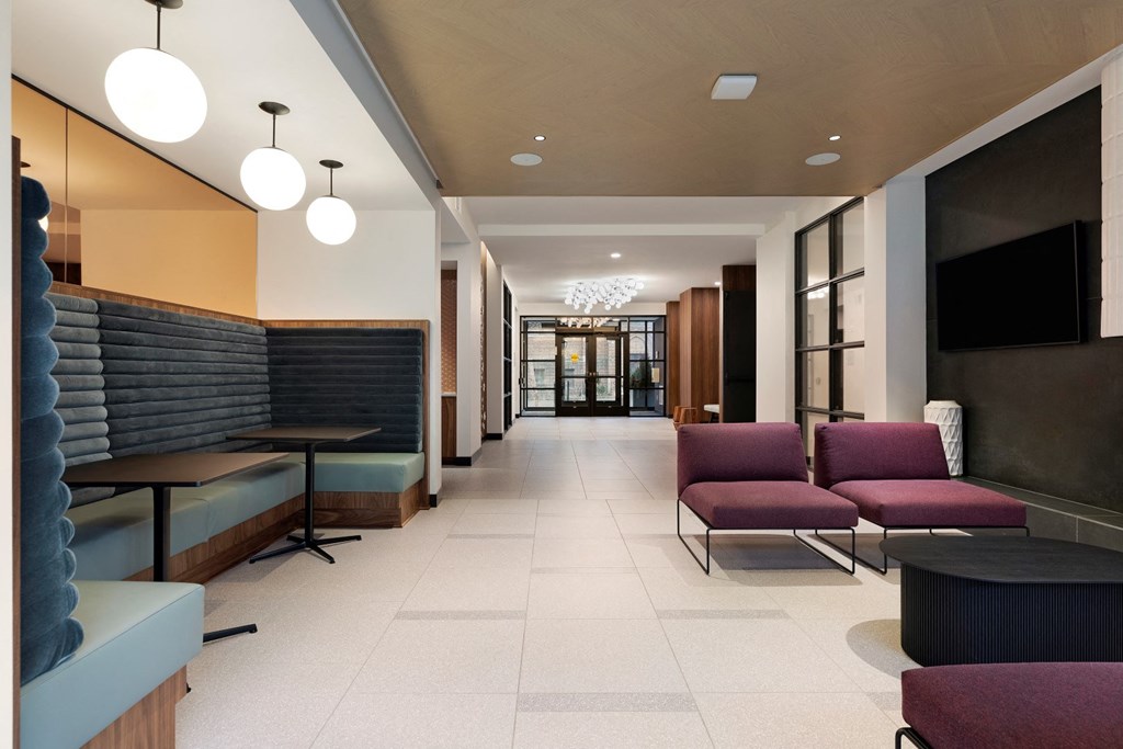Inviting Lobby Area with Plenty of Seating at The Hill Apartments in St Paul, MN