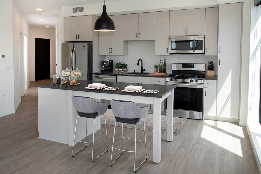 Fitted Kitchen With Island Dining at The Hill Apartments, Saint Paul