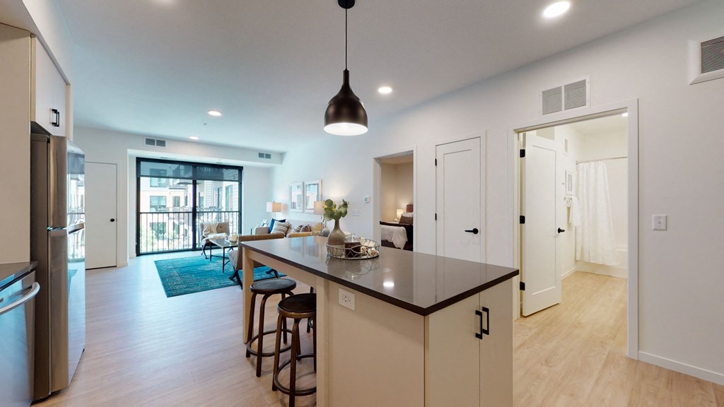 Kitchen With Living Area at The Hill Apartments, Saint Paul, MN
