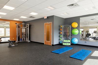 fitness center stretching and weights at the liberty apartments and town homes in golden valley Minnesota