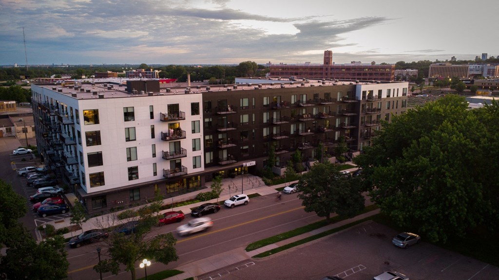 an aerial view of an apartment building in the city