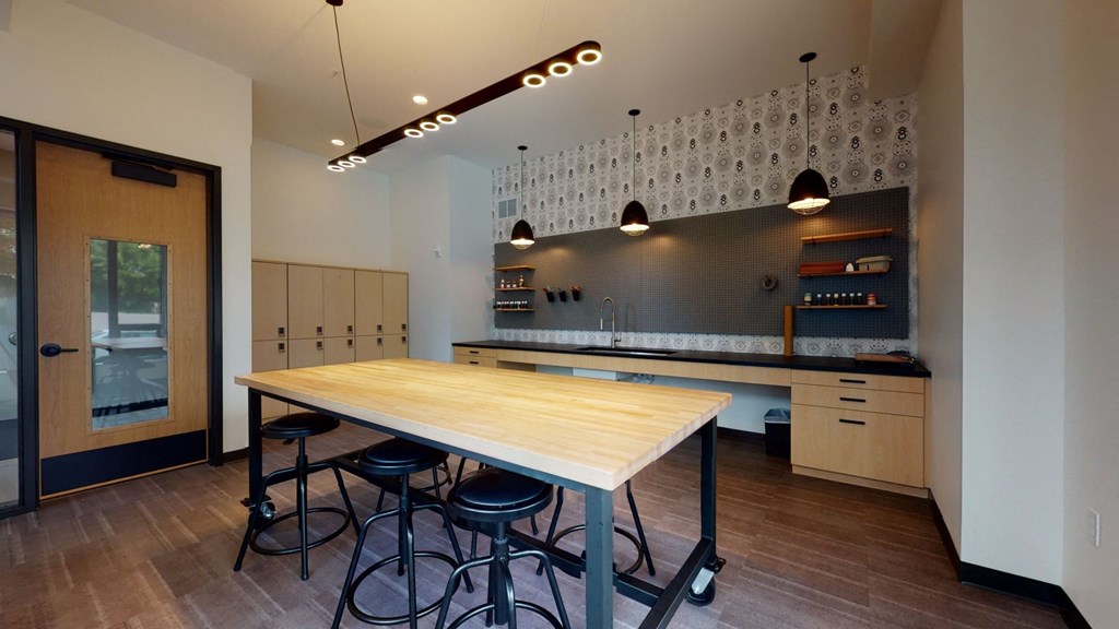 Fitted Kitchen With Island Dining at The Mason, St. Paul