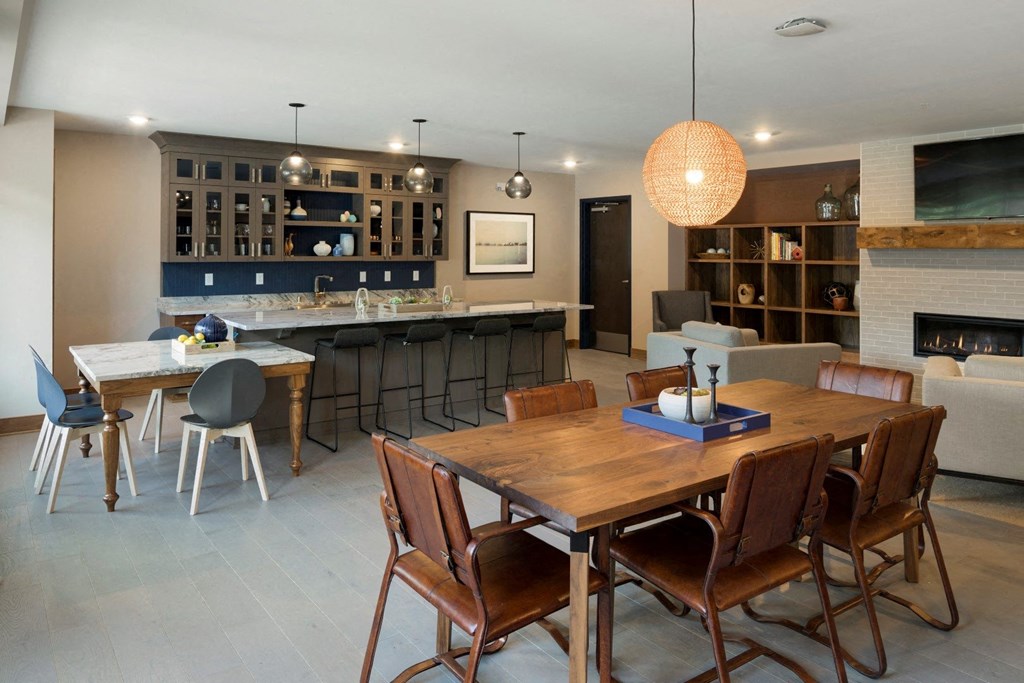 Clubroom Table With Chairs at The McMillan Apartments in Shoreview, MN 55126