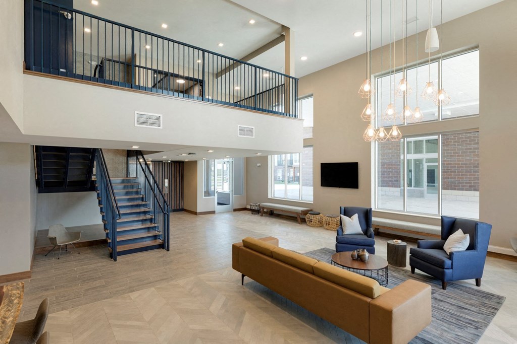 Lounge With Stairs at The McMillan Apartments in Shoreview, MN 55126