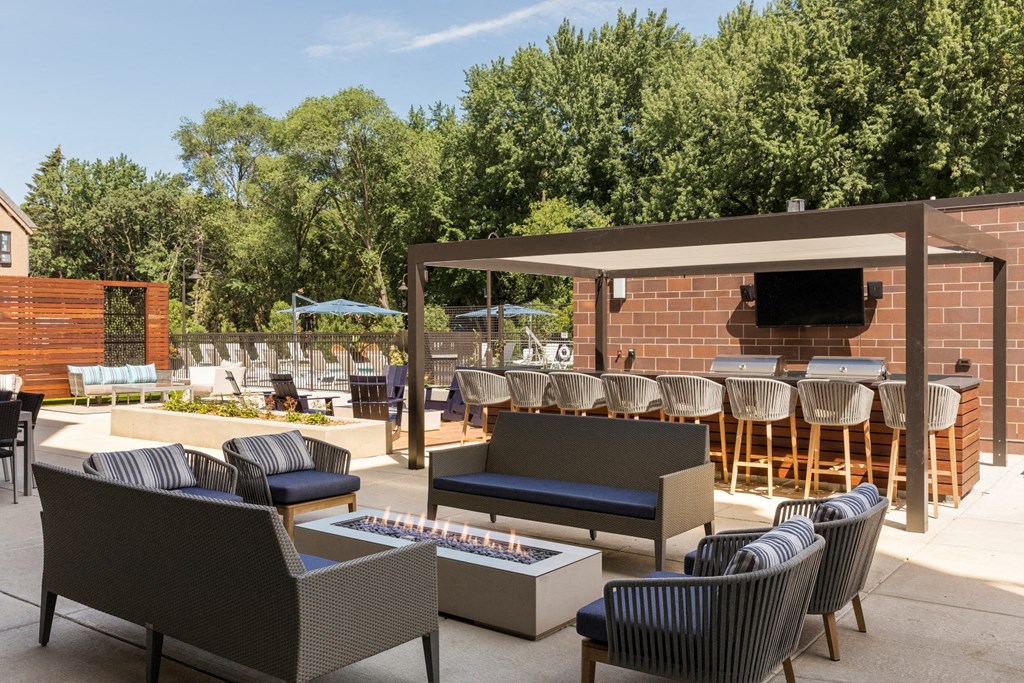 The McMillan Shoreview Exterior Sun Deck Pool Patio Grilling Area