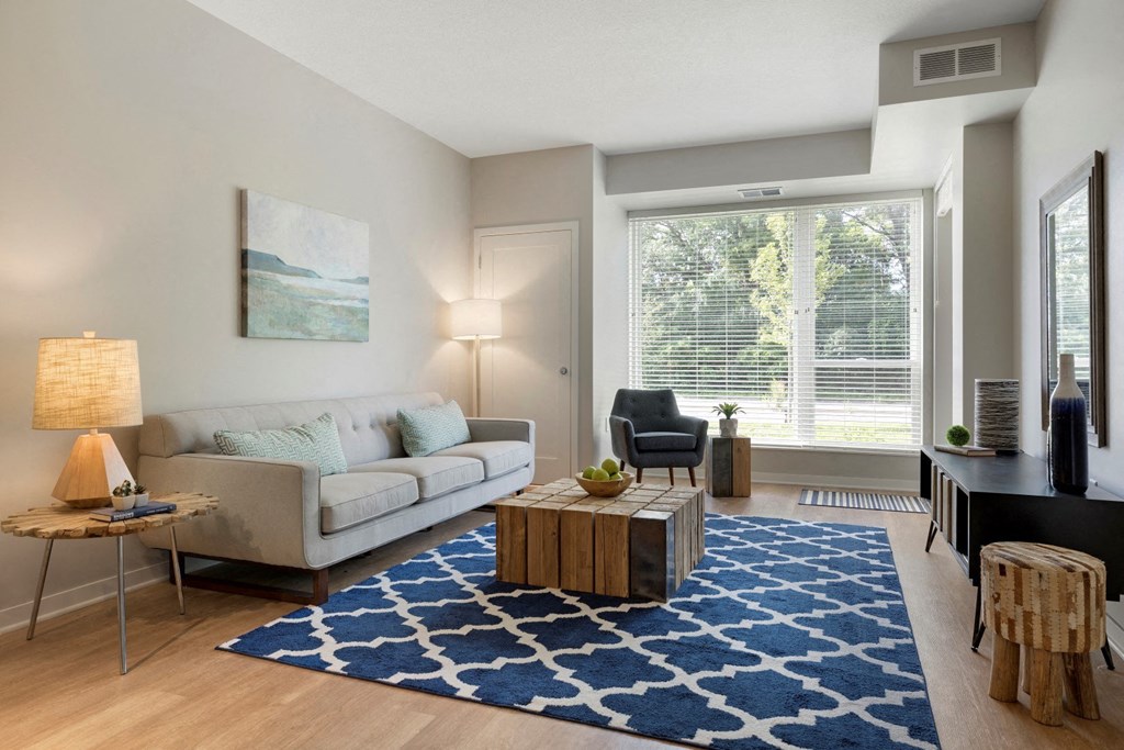 Living Room With Large Windows at The McMillan Apartments in Shoreview, MN 55126