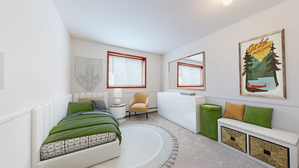 a bedroom with a bed and a couch