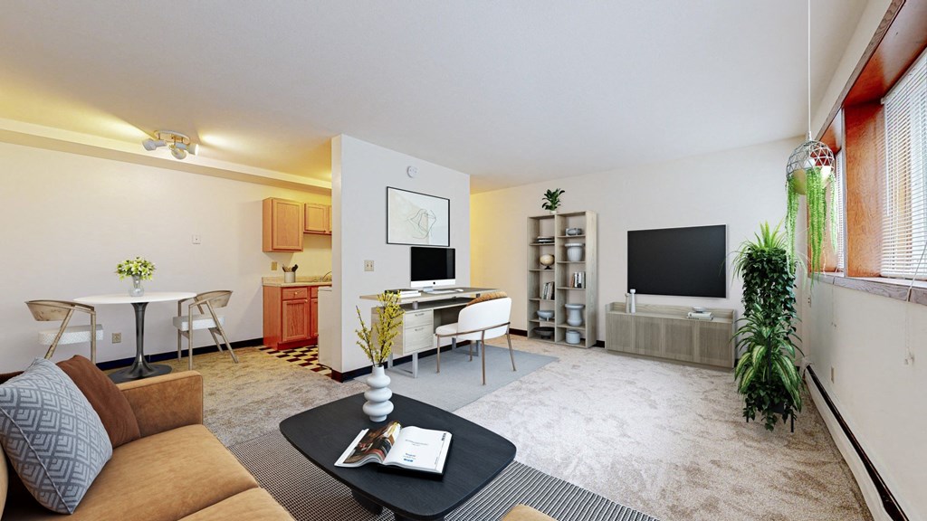 a living room filled with furniture and a flat screen tv