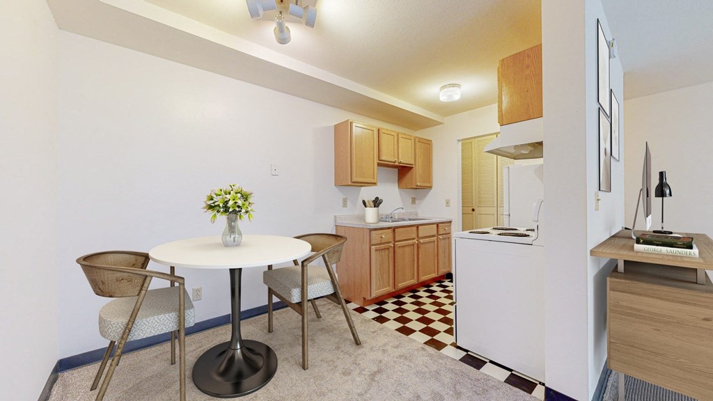a kitchen and dining area in a 555 waverly unit