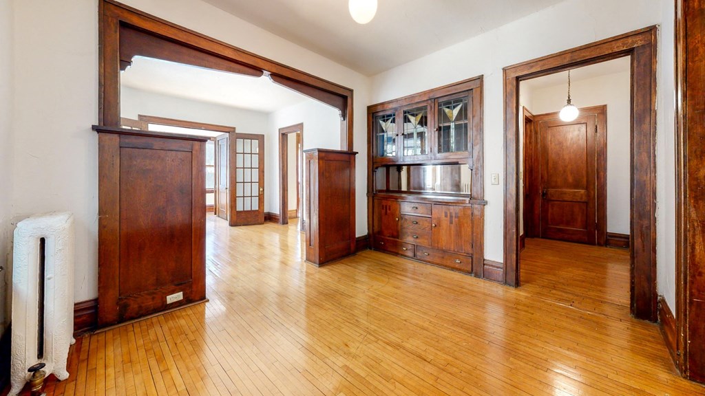 Stunning Layout with Accenting Wood Trim and Natural Restored Hardwood Flooring at The Park Apartments in Minneapolis