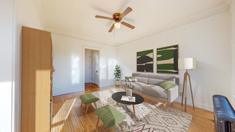 a living room with white walls and a ceiling fan