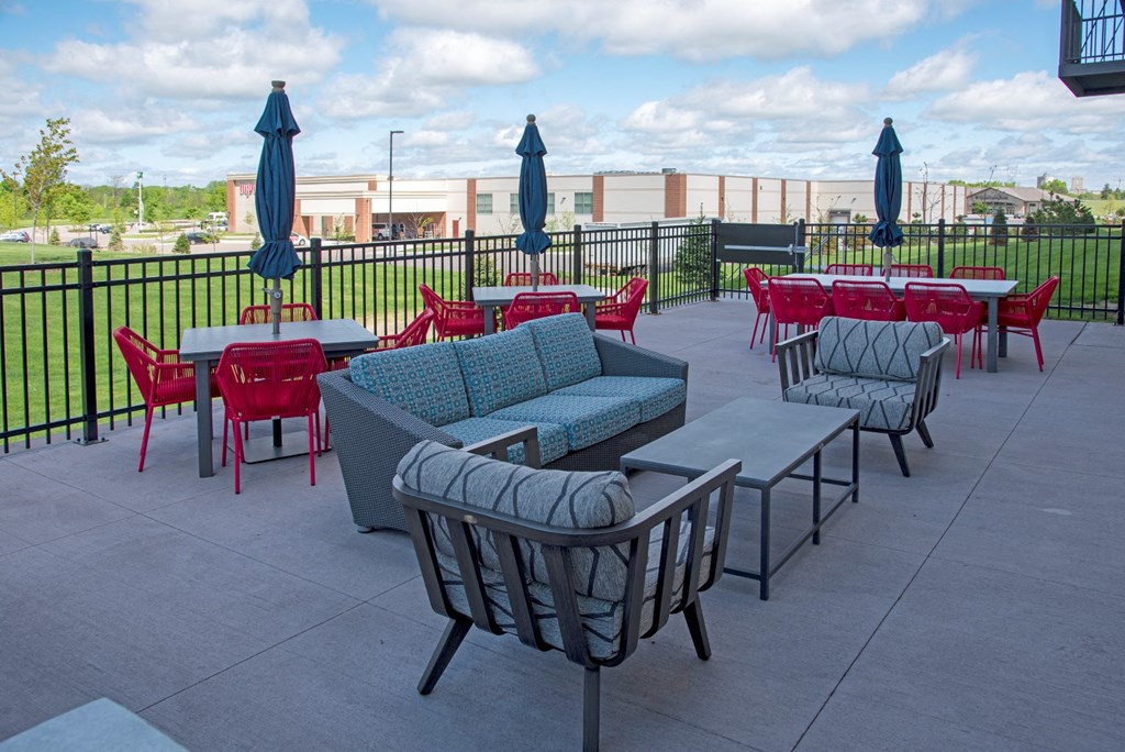 Community patio lounge and dining area at The Sixton, Shakopee