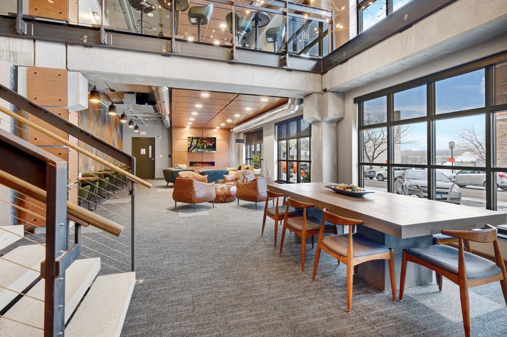 a large open room with a large table and chairs